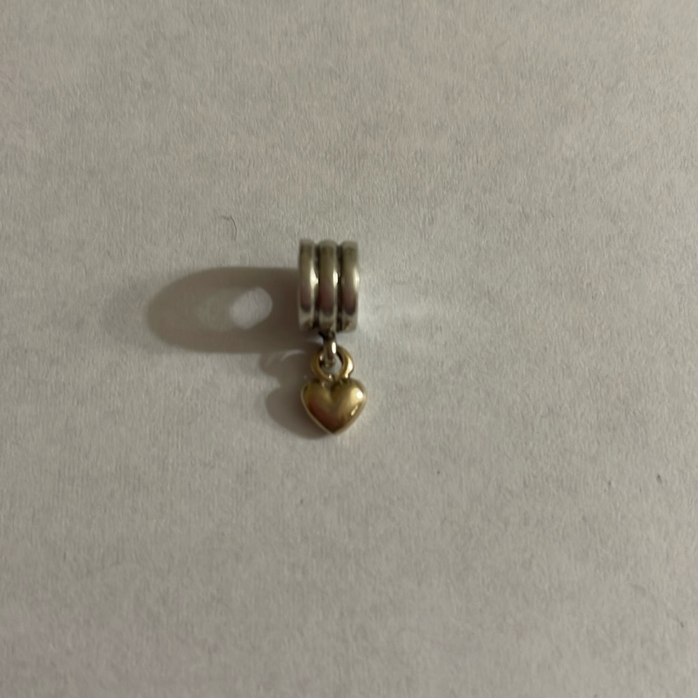 Authentic Pandora silver charm with 14kt gold heart dangle
